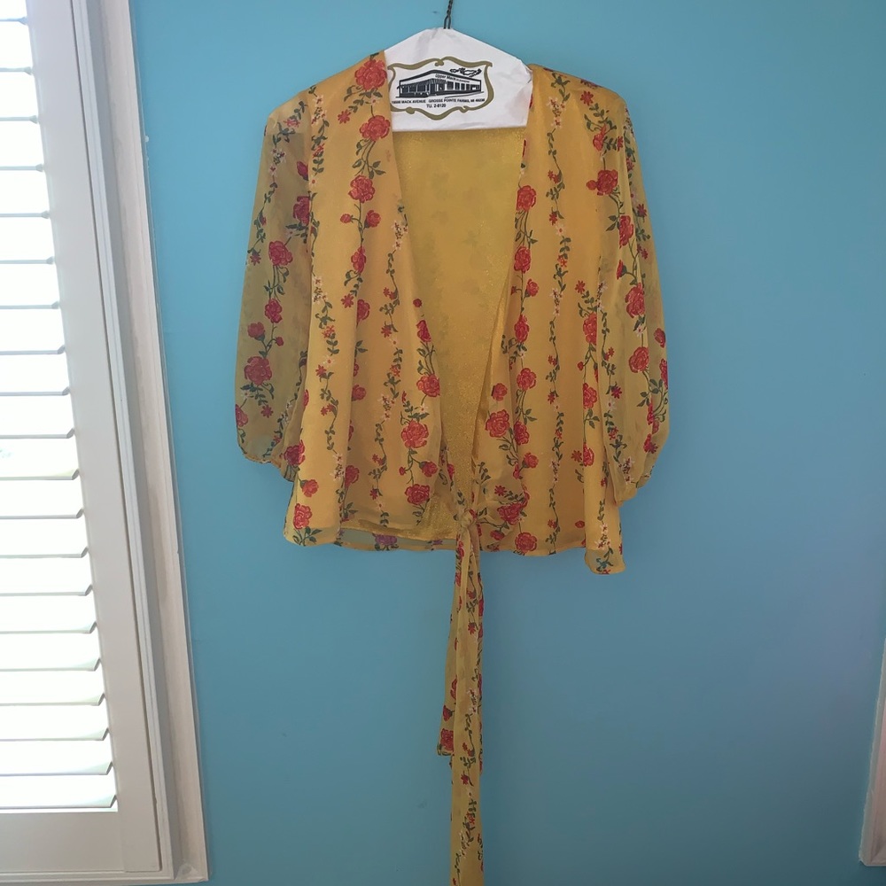 Yellow floral Wrap Blouse from Francesca’s